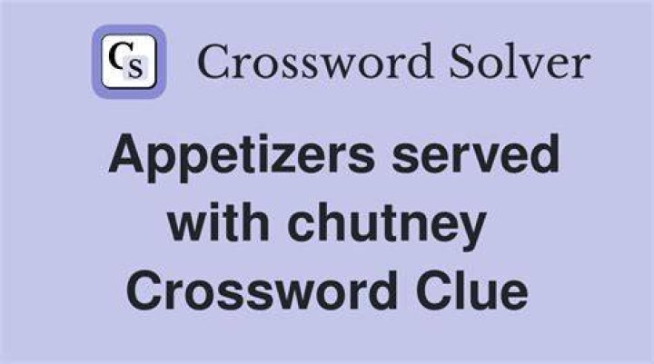 Appetizer often served with mint chutney Crossword Clue