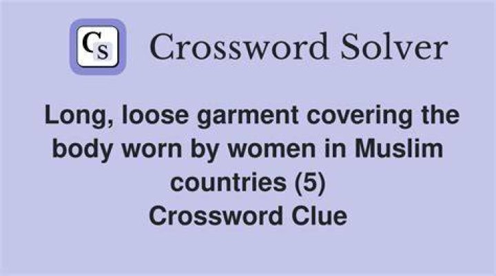 Long, loose robe Crossword Clue