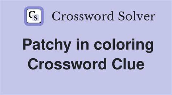 Patchy in color Crossword Clue