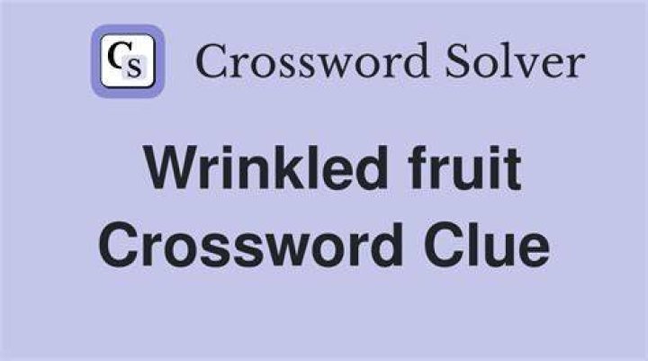 Wrinkled fruit Crossword Clue